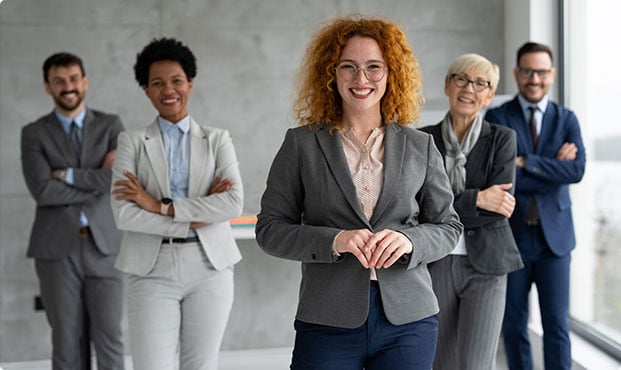 A group of professionals in business attire standing together - J. H. Lin Patent Law PC